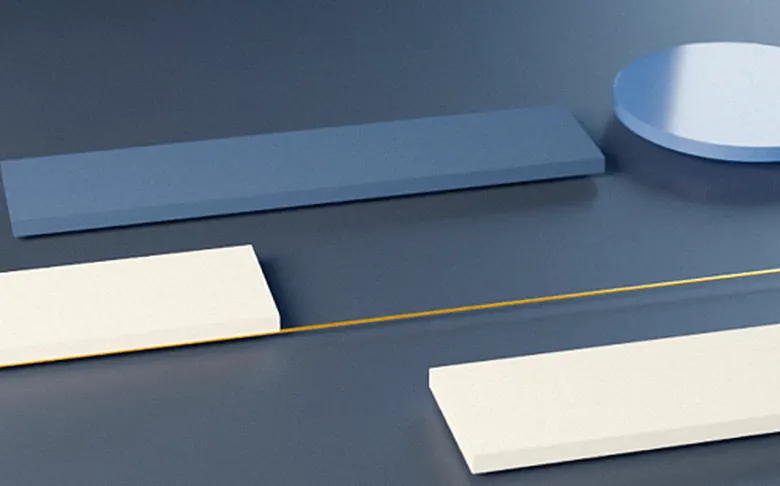 Blocks, a disc and a triangle aligned along one gold line