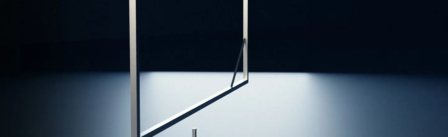 A steel frame standing in a pool of light